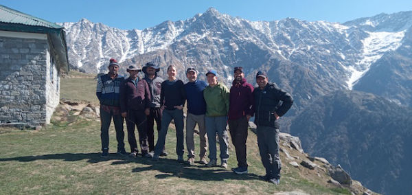 A group of hikers posing at triund after gaddi kingdom trek 